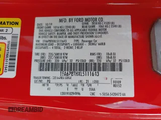 2020 Ford Mustang EcoBoost with VIN 1FA6P8THXL5111643, listed as a IAAI auction lot 42223704 with 59,170 mi miles and . Bid and sale history available at DreamBid. Image 9.