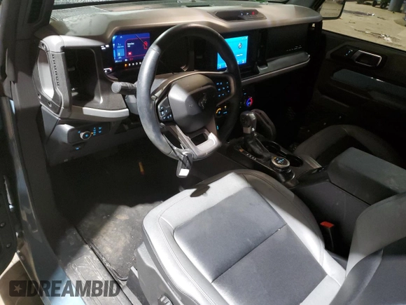 2023 Ford Bronco with VIN 1FMDE5AH2PLC08096, listed as a Copart auction lot 41843445 with 12,031 mi miles and Salvage Title. Bid and sale history available at DreamBid. Image 8.