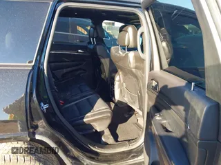 2021 Jeep Grand Cherokee 80th Anniversary with VIN 1C4RJFBG9MC527654, listed as a IAAI auction lot 41212055 with 92,436 mi miles and . Bid and sale history available at DreamBid. Image 8.