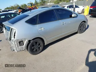 2005 Toyota Prius z VIN JTDKB20UX53080527, wystawiony jako IAAI lot #41831153 z przebiegiem 256 327 mil mil oraz . Historia ofert i sprzedaży dostępna na DreamBid. Obrazek 4.