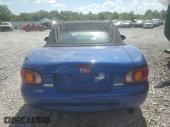 1999 Mazda MX-5 Miata with VIN JM1NB353XX0134898, listed as a Copart auction lot 63429475 with 140,595 mi miles and Clean title. Bid and sale history available at DreamBid. Image 6.
