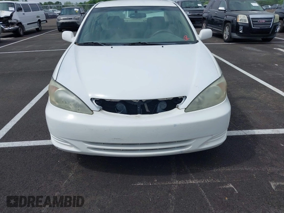 2004 Toyota Camry LE with VIN 4T1BE32K64U277496, listed as a IAAI auction lot 42130199 with 250,972 mi miles. Bid and sale history available at carsss.com. Image 6.
