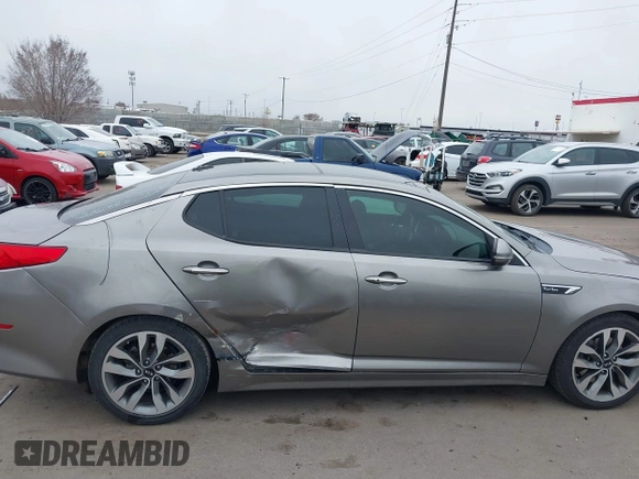 2014 Kia Optima SXL Turbo with VIN 5XXGR4A69EG312273, listed as a IAAI auction lot 41729863 with 107,660 mi miles and . Bid and sale history available at DreamBid. Image 13.