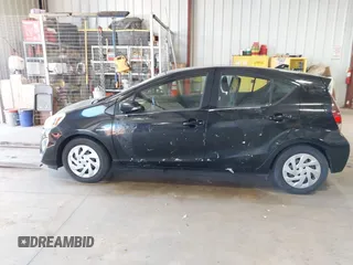2016 Toyota Prius c One with VIN JTDKDTB3XG1124674, listed as a IAAI auction lot 41976438 with 72,028 mi miles. Bid and sale history available at carsss.com. Image 14.