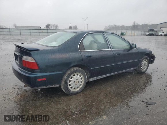1996 Honda Accord EX with VIN 1HGCD5656TA174575, listed as a Copart auction lot 86435334 with 217,784 mi miles and Salvage Title. Bid and sale history available at DreamBid. Image 3.