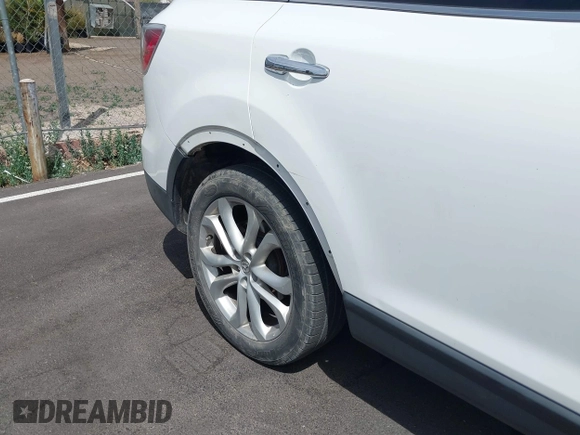 2012 Mazda CX-9 Grand Touring z VIN JM3TB3DA5C0349176, wystawiony jako IAAI lot #41960691 z przebiegiem 207 445 mil mil oraz . Historia ofert i sprzedaży dostępna na DreamBid. Obrazek 12.