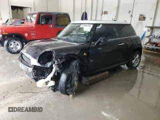 2011 MINI Hardtop with VIN WMWSU3C59BT099759, listed as a Copart auction lot 53995355 with 141,575 mi miles and Salvage Title. Bid and sale history available at DreamBid. Image 1.
