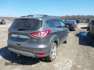 2013 Ford Escape SEL with VIN 1FMCU9H98DUB89046, listed as a IAAI auction lot 41794795 with 89,819 mi miles and . Bid and sale history available at DreamBid. Image 4.