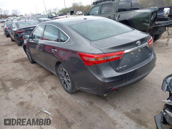 2018 Toyota Avalon XLE with VIN 4T1BK1EB9JU275097, listed as a IAAI auction lot 41940585 with 119,854 mi miles and . Bid and sale history available at DreamBid. Image 3.