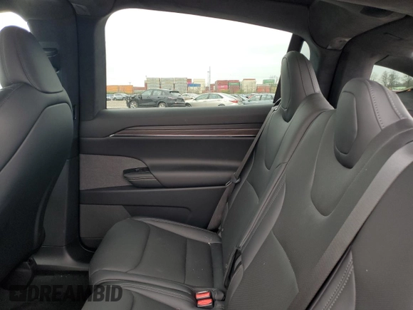 2023 Tesla Model X with VIN 7SAXCDE51PF415778, listed as a Copart auction lot 51792205 with Not Provided miles and Salvage Title. Bid and sale history available at DreamBid. Image 11.