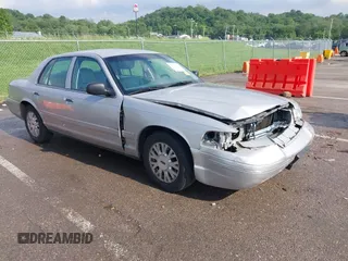 2004 Ford Crown Victoria LX z VIN 2FAFP74WX4X132788, wystawiony jako IAAI lot #42282454 z przebiegiem 165 019 mil mil oraz . Historia ofert i sprzedaży dostępna na DreamBid. Obrazek 1.