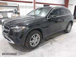 2023 Mercedes-Benz GLC with VIN W1NKM4HB1PU020439, listed as a IAAI auction lot 41676723 with 25,609 mi miles. Bid and sale history available at carsss.com. Image 2.