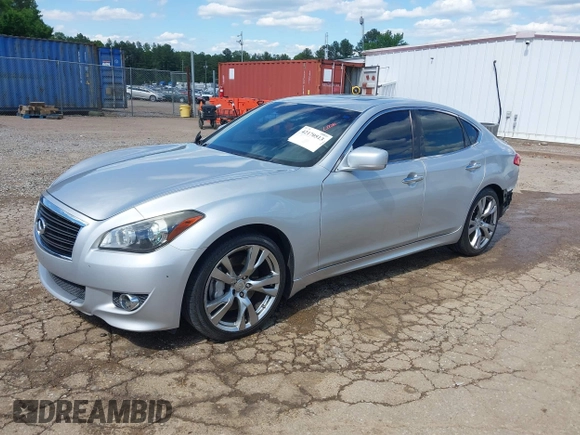 2013 Infiniti M with VIN JN1BY1AP0DM513527, listed as a IAAI auction lot 42170513 with 194,908 mi miles and . Bid and sale history available at DreamBid. Image 2.