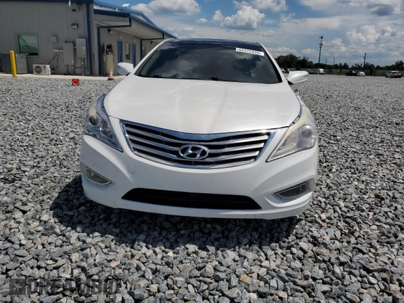 2013 Hyundai Azera z VIN KMHFH4JG4DA310590, wystawiony jako Copart lot #62472335 z przebiegiem 75 311 mil mil oraz Nie do naprawy • Non repairable. Historia ofert i sprzedaży dostępna na DreamBid. Obrazek 5.