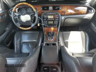 2004 Jaguar XJ with VIN SAJEA71C14SG10928, listed as a Copart auction lot 51202785 with 164,300 mi miles and Salvage Title. Bid and sale history available at carsss.com. Image 8.