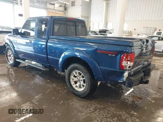 2011 Ford Ranger XLT with VIN 1FTLR4FE3BPA52049, listed as a IAAI auction lot 41394422 with 112,080 mi miles. Bid and sale history available at carsss.com. Image 3.