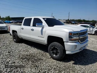 2016 Chevrolet Silverado 1500 LT with VIN 3GCUKREC9GG185402, listed as a Copart auction lot 52292115 with 131,861 mi miles and Salvage Title. Bid and sale history available at DreamBid. Image 4.
