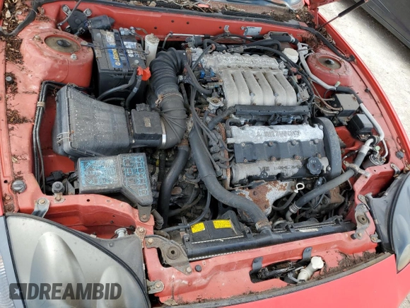 1999 Mitsubishi 3000GT GT z VIN JA3AM84J4XY001608, wystawiony jako Copart lot #64366944 z przebiegiem 153 804 mil mil oraz Tytuł czysty. Historia ofert i sprzedaży dostępna na DreamBid. Obrazek 11.