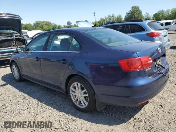 2014 Volkswagen Jetta SE with VIN 3VWD17AJ9EM323625, listed as a Copart auction lot 58211655 with 108,099 mi miles and Salvage title. Bid and sale history available at DreamBid. Image 2.