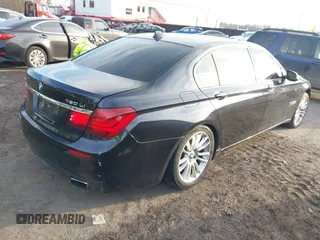2015 BMW 7 Series 750Li xDrive with VIN WBAYF8C52FD654892, listed as a IAAI auction lot 41368616 with 158,140 mi miles. Bid and sale history available at carsss.com. Image 4.
