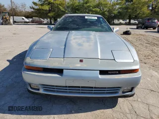 1989 Toyota Supra z VIN JT2MA70J8K0114002, wystawiony jako Copart lot #78068714 z przebiegiem 196 448 mil mil oraz Czysty tytuł • Clean title. Historia ofert i sprzedaży dostępna na DreamBid. Obrazek 5.