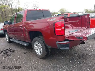 2017 Chevrolet Silverado 1500 LT with VIN 3GCUKREC8HG336120, listed as a IAAI auction lot 41919441 with 64,029 mi miles. Bid and sale history available at carsss.com. Image 3.