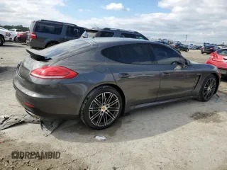 2016 Porsche Panamera 4 z VIN WP0AA2A77GL002362, wystawiony jako Copart lot #46124245 z przebiegiem 71 303 mil mil oraz Szkody całkowita. Historia ofert i sprzedaży dostępna na DreamBid. Obrazek 3.