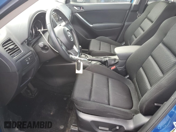 2014 Mazda CX-5 Touring with VIN JM3KE4CY3E0381134, listed as a Copart auction lot 52115015 with 52,162 mi miles and Salvage Title. Bid and sale history available at carsss.com. Image 7.