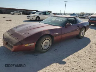1986 Chevrolet Corvette with VIN 1G1YY0789G5118657, listed as a Copart auction lot 77743794 with 97,673 mi miles and Salvage Title. Bid and sale history available at carsss.com. Image 1.