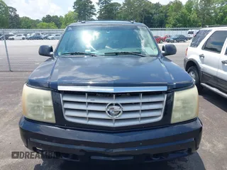 2003 Cadillac Escalade z VIN 1GYEC63T73R187253, wystawiony jako IAAI lot #42299186 z przebiegiem 288 373 mil mil oraz . Historia ofert i sprzedaży dostępna na DreamBid. Obrazek 6.