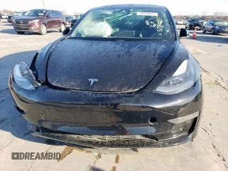 2021 Tesla Model 3 Standard Range Plus with VIN 5YJ3E1EA2MF977007, listed as a Copart auction lot 48516075 with Not Provided miles and Salvage Title. Bid and sale history available at DreamBid. Image 5.