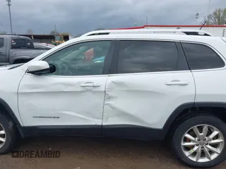 2014 Jeep Cherokee Limited with VIN 1C4PJMDB2EW281396, listed as a IAAI auction lot 42075036 with 113,578 mi miles and . Bid and sale history available at DreamBid. Image 14.