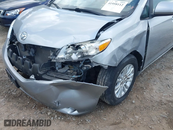 2015 Toyota Sienna XLE with VIN 5TDYK3DC7FS659864, listed as a IAAI auction lot 41958112 with 121,257 mi miles and . Bid and sale history available at DreamBid. Image 6.