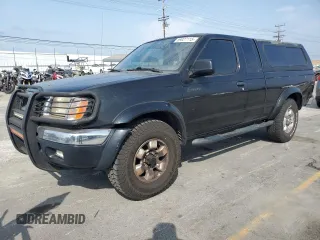 1999 Nissan Frontier XE z VIN 1N6ED26Y6XC322554, wystawiony jako Copart lot #59027115 z przebiegiem 170 302 mil mil oraz Szkoda całkowita • Salvage title. Historia ofert i sprzedaży dostępna na DreamBid. Obrazek 1.