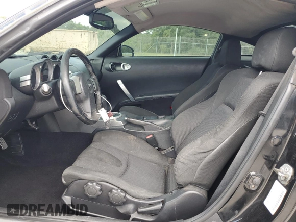 2003 Nissan 350Z Touring z VIN JN1AZ34E63T003086, wystawiony jako Copart lot #54011315 z przebiegiem 222 583 mil mil oraz Szkoda całkowita • Salvage title. Historia ofert i sprzedaży dostępna na DreamBid. Obrazek 7.
