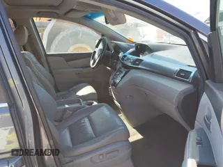 2012 Honda Odyssey EX-L with VIN 5FNRL5H69CB128585, listed as a IAAI auction lot 41695109 with 231,565 mi miles and . Bid and sale history available at carsss.com. Image 5.
