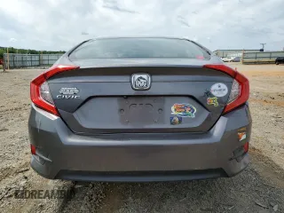 2017 Honda Civic LX z VIN 19XFC2F55HE214470, wystawiony jako Copart lot #57785675 z przebiegiem 81 862 mil mil oraz Szkoda całkowita • Salvage title. Historia ofert i sprzedaży dostępna na DreamBid. Obrazek 6.