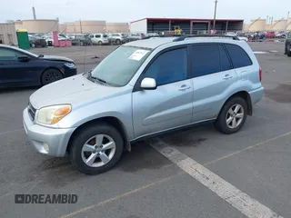 2005 Toyota RAV4 with VIN JTEGD20VX50047632, listed as a IAAI auction lot 41827122 with 214,716 mi miles. Bid and sale history available at carsss.com. Image 2.