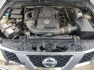 2006 Nissan Frontier SE z VIN 1N6AD06U16C416677, wystawiony jako Copart lot #47777995 z przebiegiem 173 997 mil mil oraz Szkoda całkowita • Salvage title. Historia ofert i sprzedaży dostępna na DreamBid. Obrazek 13.