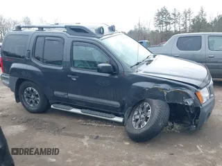 2014 Nissan Xterra X with VIN 5N1AN0NW5EN810488, listed as a IAAI auction lot 41705791 with 127,936 mi miles and . Bid and sale history available at DreamBid. Image 13.