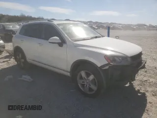 2012 Volkswagen Touareg Sport z VIN WVGFK9BP5CD000233, wystawiony jako Copart lot #46517515 z przebiegiem 198 242 mil mil oraz Szkoda całkowita • Salvage title. Historia ofert i sprzedaży dostępna na DreamBid. Obrazek 4.