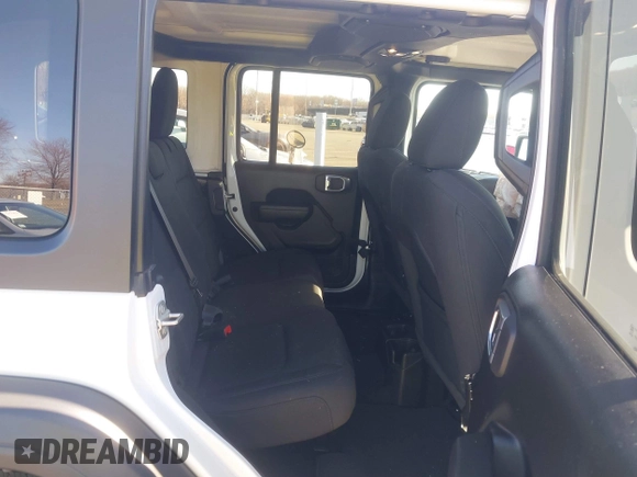 2023 Jeep Wrangler Sport S with VIN 1C4HJXDN4PW702277, listed as a IAAI auction lot 41835864 with 27,768 mi miles and . Bid and sale history available at DreamBid. Image 8.