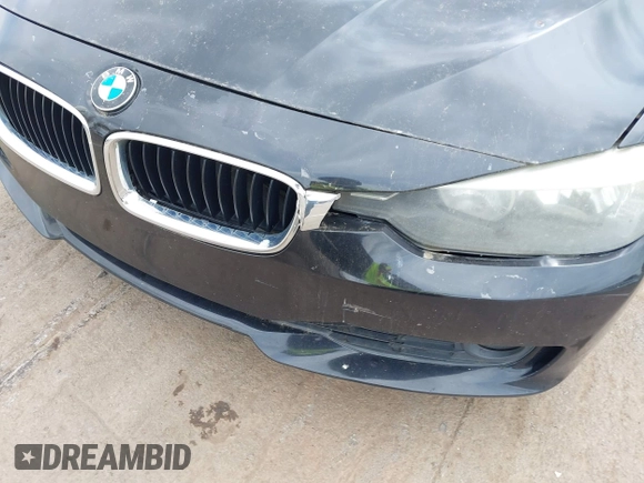 2012 BMW 3 Series 328i with VIN WBA3A5G51CNP17522, listed as a IAAI auction lot 42124868 with 154,385 mi miles and . Bid and sale history available at carsss.com. Image 12.