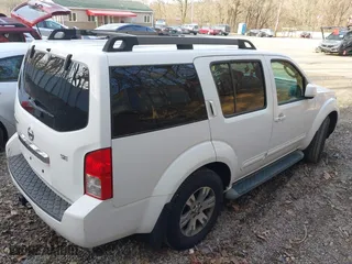 2010 Nissan Pathfinder S with VIN 5N1AR1NB5AC604679, listed as a IAAI auction lot 41774279 with 94,249 mi miles. Bid and sale history available at carsss.com. Image 4.