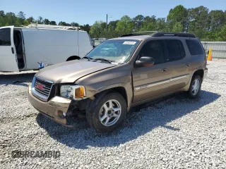 2003 GMC Envoy XL SLE with VIN 1GKES16S236145643, listed as a Copart auction lot 52568345 with 145,442 mi miles and Salvage Title. Bid and sale history available at carsss.com. Image 1.