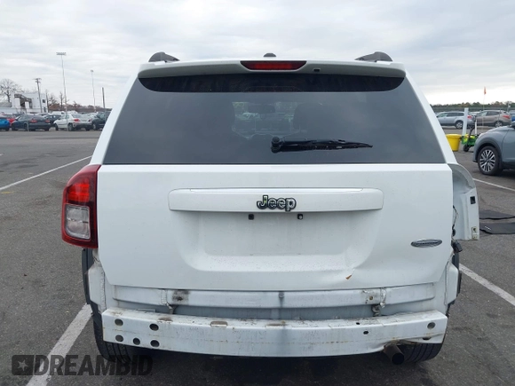 2016 Jeep Compass Latitude with VIN 1C4NJCEA3GD735161, listed as a IAAI auction lot 40881008 with 126,384 mi miles. Bid and sale history available at carsss.com. Image 6.