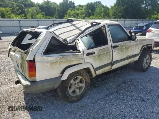 1999 Jeep Cherokee Sport z VIN 1J4FF68S3XL597049, wystawiony jako Copart lot #58736325 z przebiegiem 134 684 mil mil oraz Nie do naprawy • Non repairable. Historia ofert i sprzedaży dostępna na DreamBid. Obrazek 3.