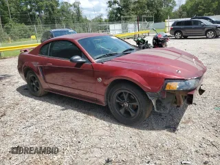 2004 Ford Mustang Standard with VIN 1FAFP40674F136300, listed as a Copart auction lot 86332804 with 163,996 mi miles and Salvage Title. Bid and sale history available at carsss.com. Image 4.