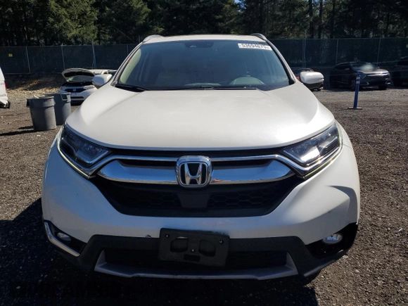2018 Honda CR-V Touring with VIN 2HKRW2H9XJH619830, listed as a Copart auction lot 53694675 with 95,703 mi miles and Salvage title. Bid and sale history available at DreamBid. Image 5.