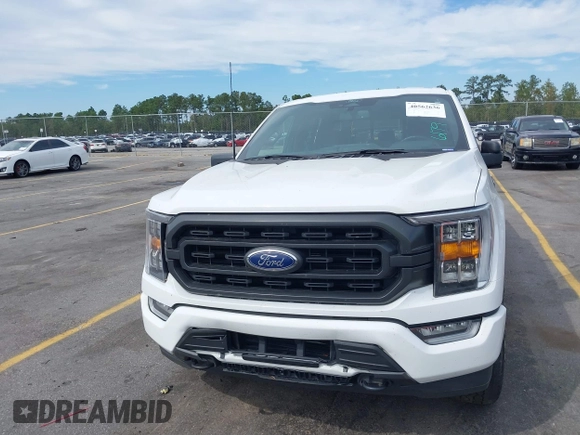 2021 Ford F-150 XL z VIN 1FTFW1E86MFC44784, wystawiony jako IAAI lot #40562636 z przebiegiem 56 427 mil mil oraz . Historia ofert i sprzedaży dostępna na DreamBid. Obrazek 12.